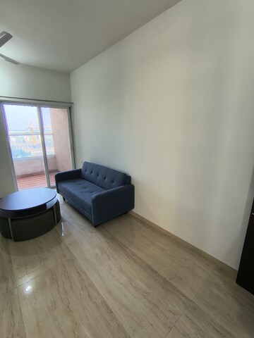 Living Room in 1 BHK Apartment at VTP Cygnus, Kharadi – for Rent