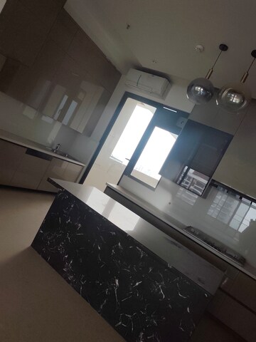 Kitchen in 4 BHK Apartment at Mahagun Mezzaria, Sector 78 – for Rent