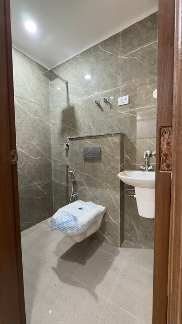 Bathroom in 2 BHK Builder Floor at Chattarpur – for Rent