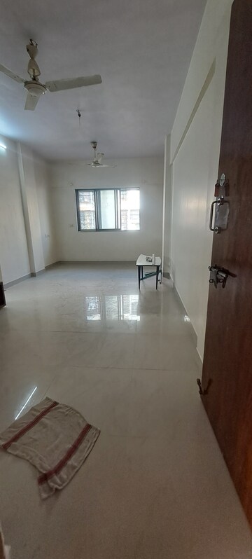 Living Room in 1 BHK Apartment at Neha CHS, Malad West – for Rent