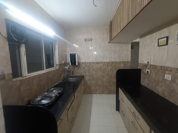 Kitchen in 1 BHK Apartment at Siddhivinayak Ginger, Pimple Saudagar – for Rent