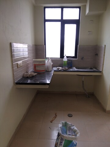 Kitchen in 1 BHK Apartment at Auric City Homes, Sector 82 – for Rent