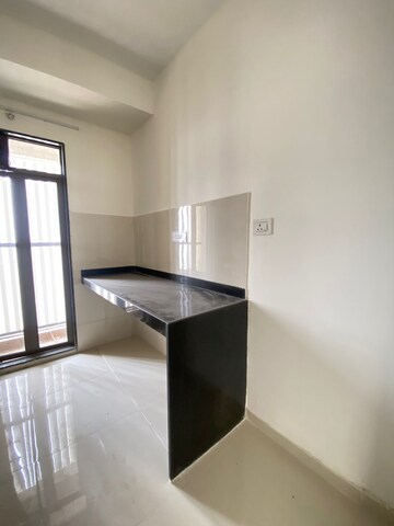 Kitchen in 1.5 BHK Apartment at Runwal My City, Dombivli East – for Sale