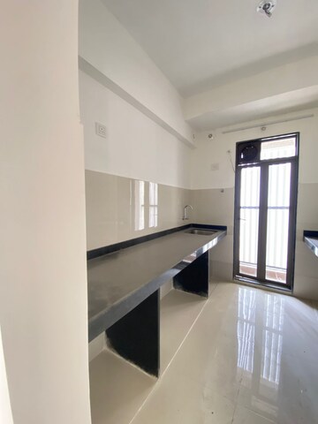 Kitchen in 1.5 BHK Apartment at Runwal My City, Dombivli East – for Sale
