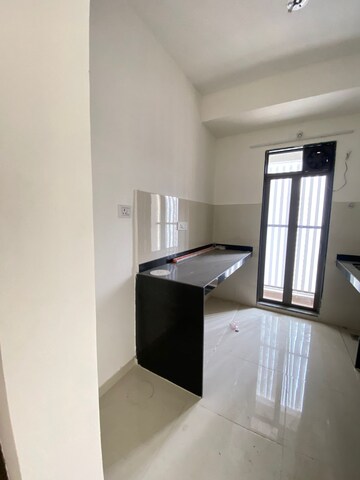 Kitchen in 1.5 BHK Apartment at Runwal My City, Dombivli East – for Sale