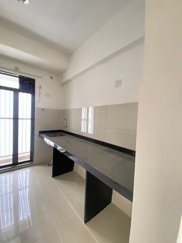 Kitchen in 1.5 BHK Apartment at Runwal My City, Dombivli East – for Sale