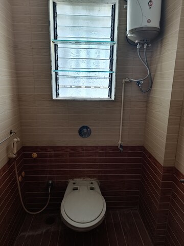 Bathroom in 2 BHK Apartment at Suyog CHS Tilak Nagar, Tilak Nagar – for Rent