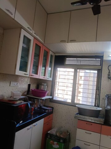 Kitchen in 2 BHK Apartment at Satyam Raj Residency, Thane West – for Rent