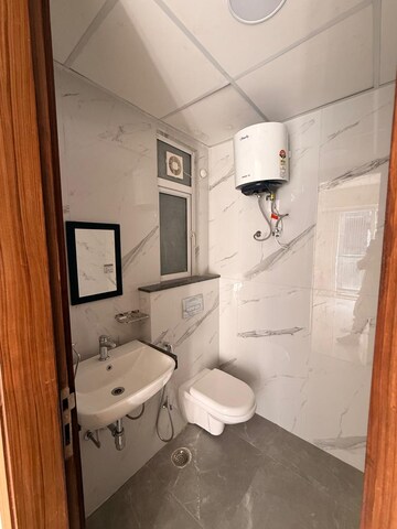 Bathroom in 2.5 BHK Builder Floor at M3M Soulitude, Sector 89 – for Rent