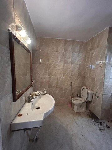 Bathroom in 2 BHK Apartment at Khirki Extension – for Rent