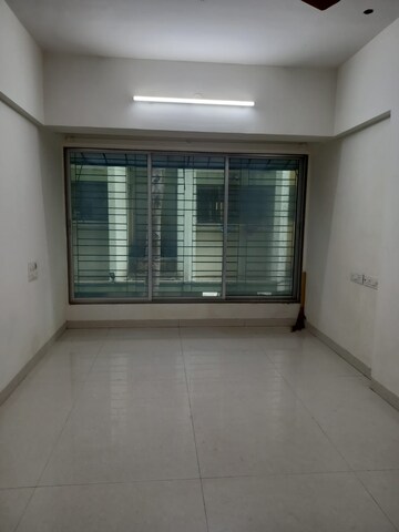 Room in 1 BHK Apartment at Rajhans Society, Goregaon East – for Rent