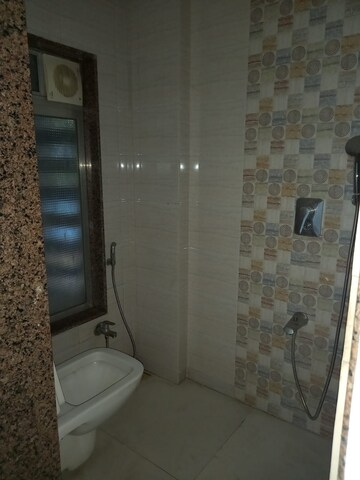Bathroom in 1 BHK Apartment at Rajhans Society, Goregaon East – for Rent