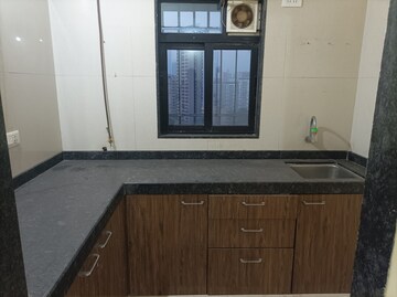 Kitchen in 1 BHK Apartment at Raunak Bliss, Ghodbunder Road – for Rent
