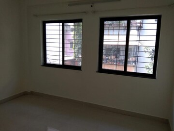 Living Room in 2 BHK Apartment at Ganeshnagar CHS, Kothrud – for Rent