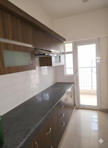 Kitchen in 2 BHK Apartment at MCC Signature Heights, Raj Nagar Extension – for Rent