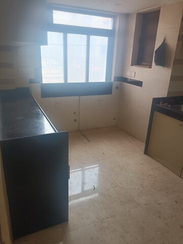 Kitchen in 3 BHK Apartment at Prarthna Heights, Parel – for Rent