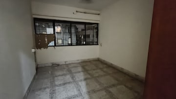 Bedroom in 2 BHK Apartment at Rizvi Heights, Senapati Bapat Marg – for Rent