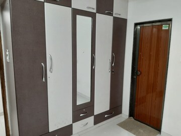 Bedroom in 1 BHK Apartment at Dheeraj Godavari Apartment, Malad West – for Sale