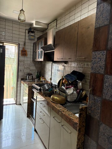 Kitchen in 3 BHK Apartment at New Krishna Tower, Kopar Khairane – for Sale