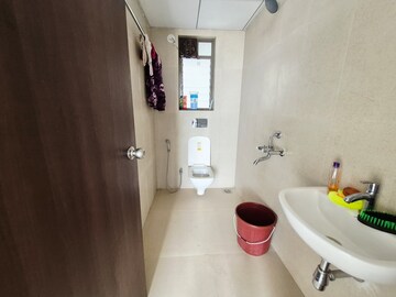 Bathroom in 1 BHK Apartment at Runwal My City, Dombivli East – for Rent