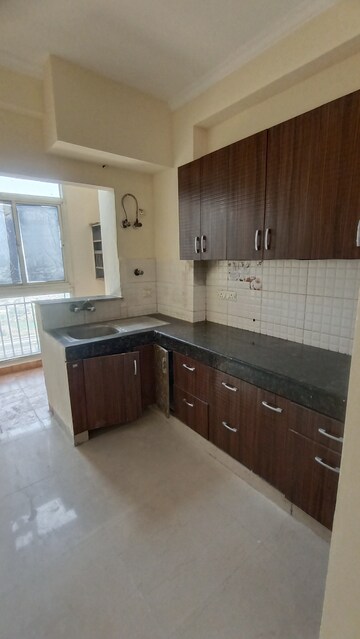 Kitchen in 2 BHK Apartment at Antriksh Golf View, Sector 78 – for Rent