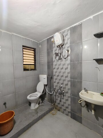 Bathroom in 1 BHK Apartment at Wadgaon Sheri – for Rent