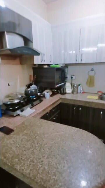 Kitchen in 2 BHK Apartment at SRS Royal Hills, Sector 87 – for Sale