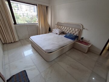 Bedroom in 3 BHK Apartment at Sarkar Avenue Apartment, Santacruz West – for Rent