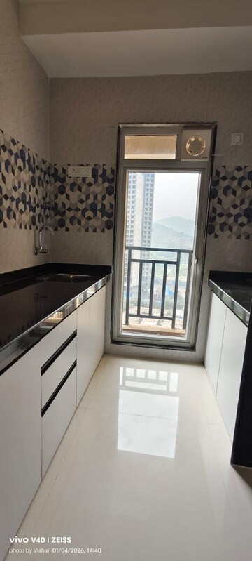 Kitchen in 1 BHK Apartment at Raunak Bliss, Ghodbunder Road – for Rent