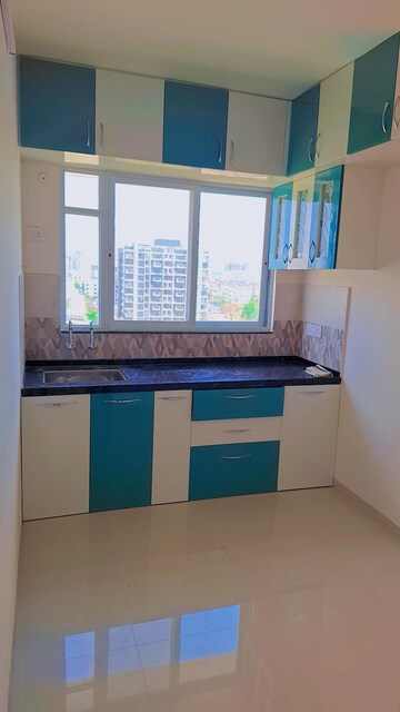 Kitchen in 2 BHK Apartment at Unique K Town, Kiwale – for Rent