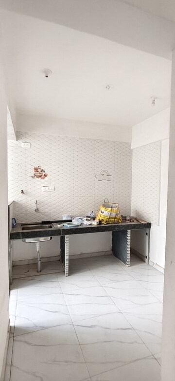 Kitchen in 1 BHK Apartment at Wadgaon Sheri – for Rent