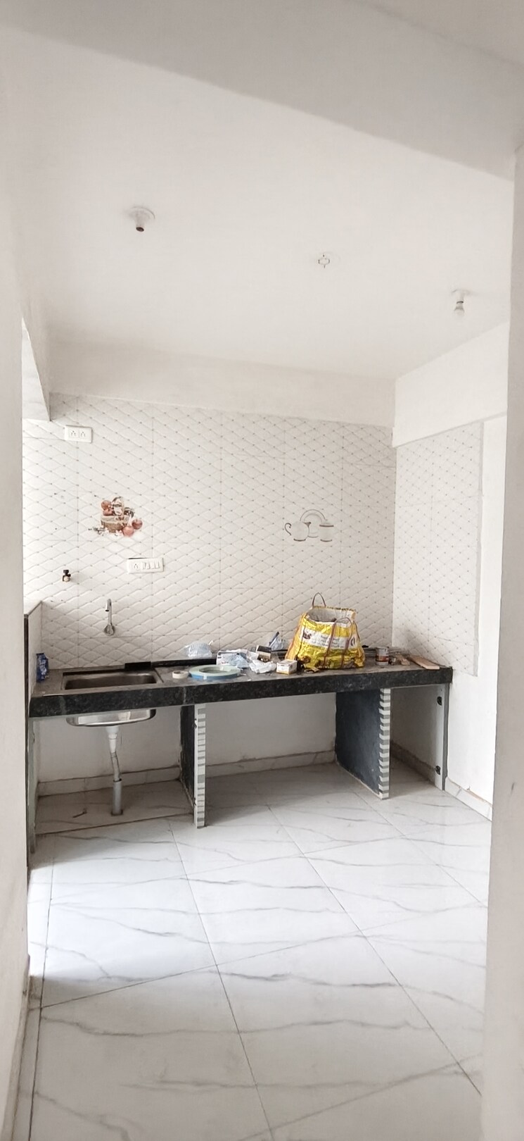 Kitchen, wadgaon sheri 1 Bedroom 586 Sq.Ft. Apartment In Wadgaon Sheri Pune 9731152