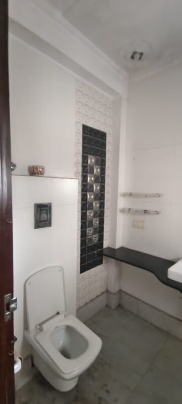 Bathroom in 4 BHK Builder Floor at Roop Nagar – for Rent