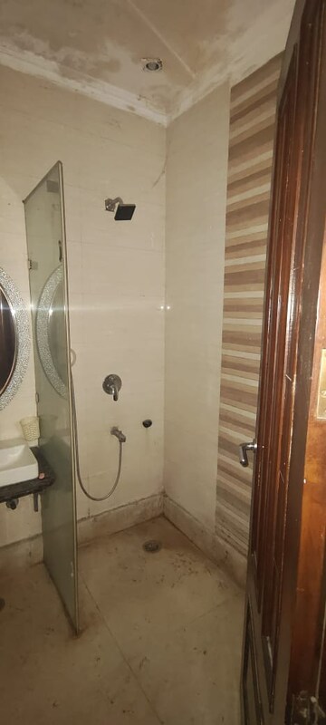 Bathroom in 4 BHK Builder Floor at Roop Nagar – for Rent