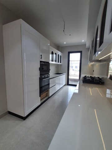 Kitchen in 4 BHK Builder Floor at Ansal Versalia Avante, Sector 67a – for Sale