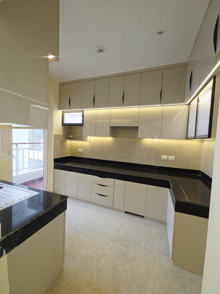 Kitchen, rishita-mulberry-heights 3.5 Bedroom 1964 Sq.Ft. Apartment In Sushant Golf City Lucknow 9731262