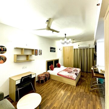 Living Room in Studio Apartment at Nimbus The Golden Palm, Sector 168 – for Sale