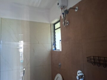 Bathroom in 1 BHK Apartment at Vihang Valley Phase 3, Kasarvadavali – for Rent