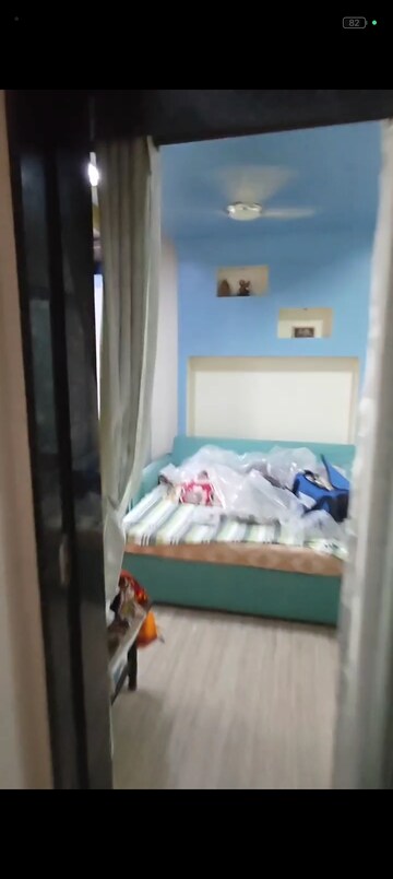 Bedroom in 2 BHK Apartment at New Mhada Towers, Andheri West – for Sale