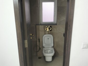 Bathroom in 2 BHK Apartment at Smart World Orchard, Sector 61 – for Sale
