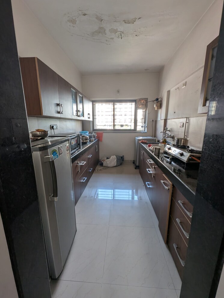 Kitchen, kalpataru-estate 2.5 Bedroom 1050 Sq.Ft. Apartment In Pimple Gurav Pune 9731759