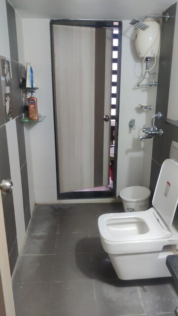 Bathroom in 2 BHK Apartment at Jangid Galaxy, Ghodbunder Road – for Rent
