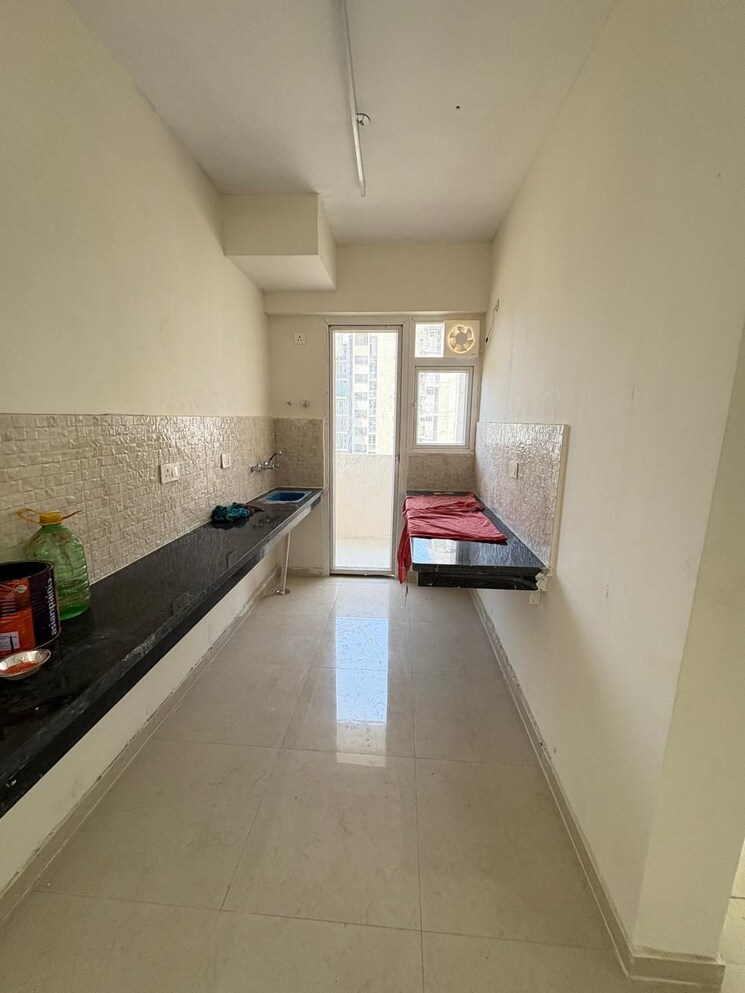 Kitchen, signature-the-millennia-3 2 Bedroom 687 Sq.Ft. Apartment In Sector 37d Gurgaon 9731945