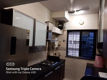 Kitchen in 1 BHK Apartment at K Raheja Palm Court, Malad West – for Sale