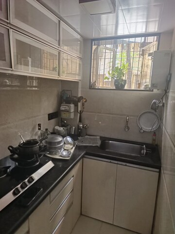 Kitchen in 1.5 BHK Apartment at Adarsh Nagar Society, Worli – for Rent