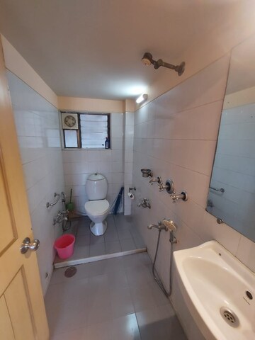 Bathroom in 2 BHK Apartment at Silver Sand CHS, Andheri West – for Rent