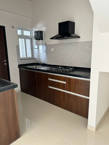 Kitchen in 3 BHK Apartment at Gera World of Joy, Kharadi – for Sale
