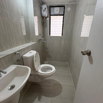 Bathroom in 1 BHK Apartment at Runwal Gardens Phase 3, Kalyan Shilphata Road – for Rent