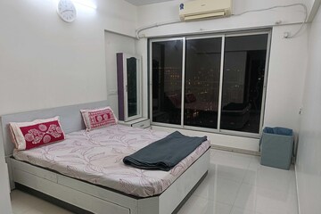 Bedroom in 2 BHK Apartment at Andheri CHS, Andheri West – for Rent