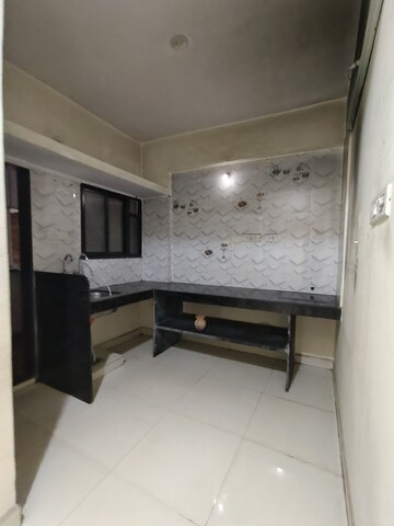 Kitchen in 1 BHK Apartment at Wadgaon Sheri – for Rent